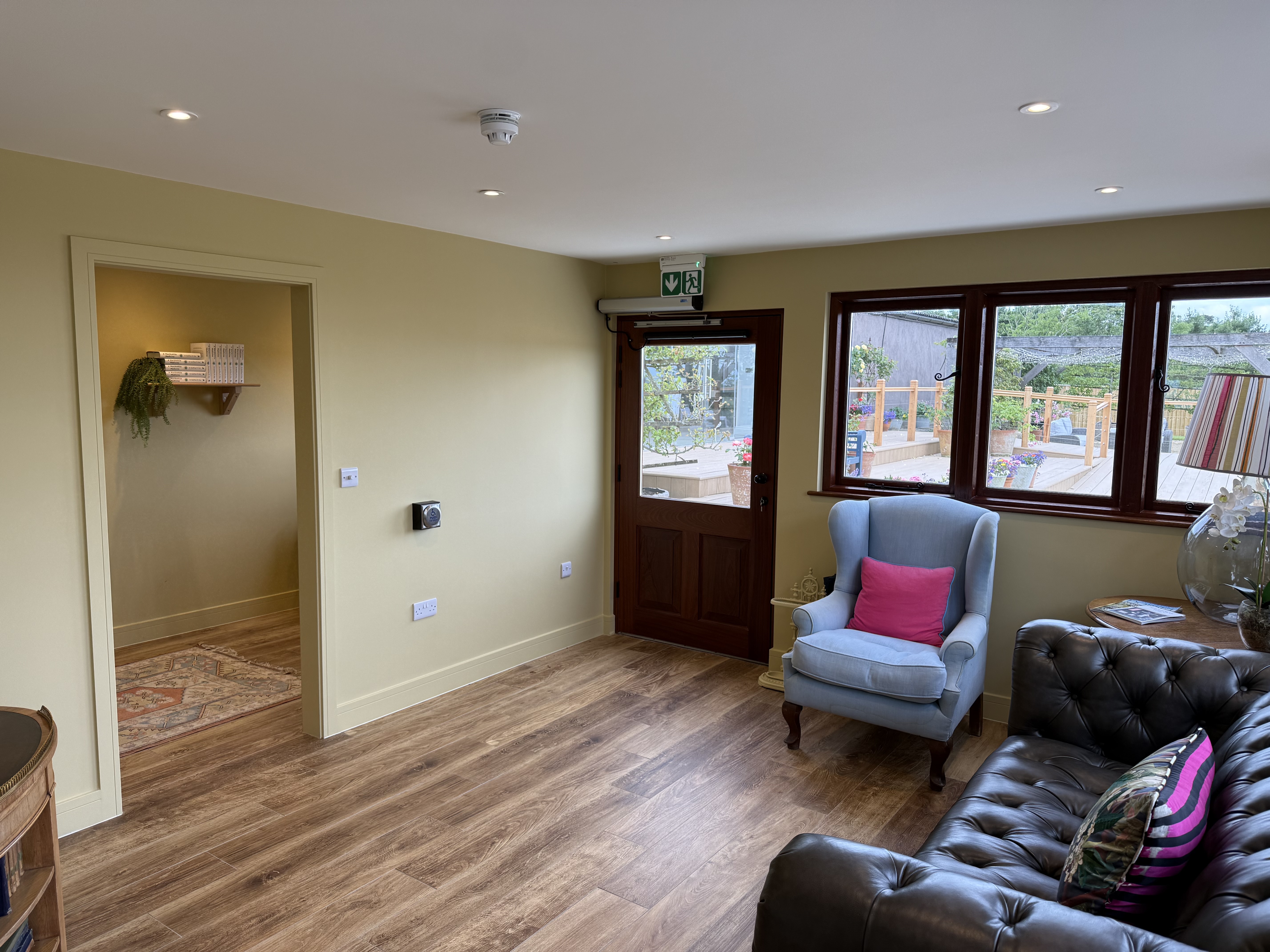 Automatic door closer with disabled push-button access
