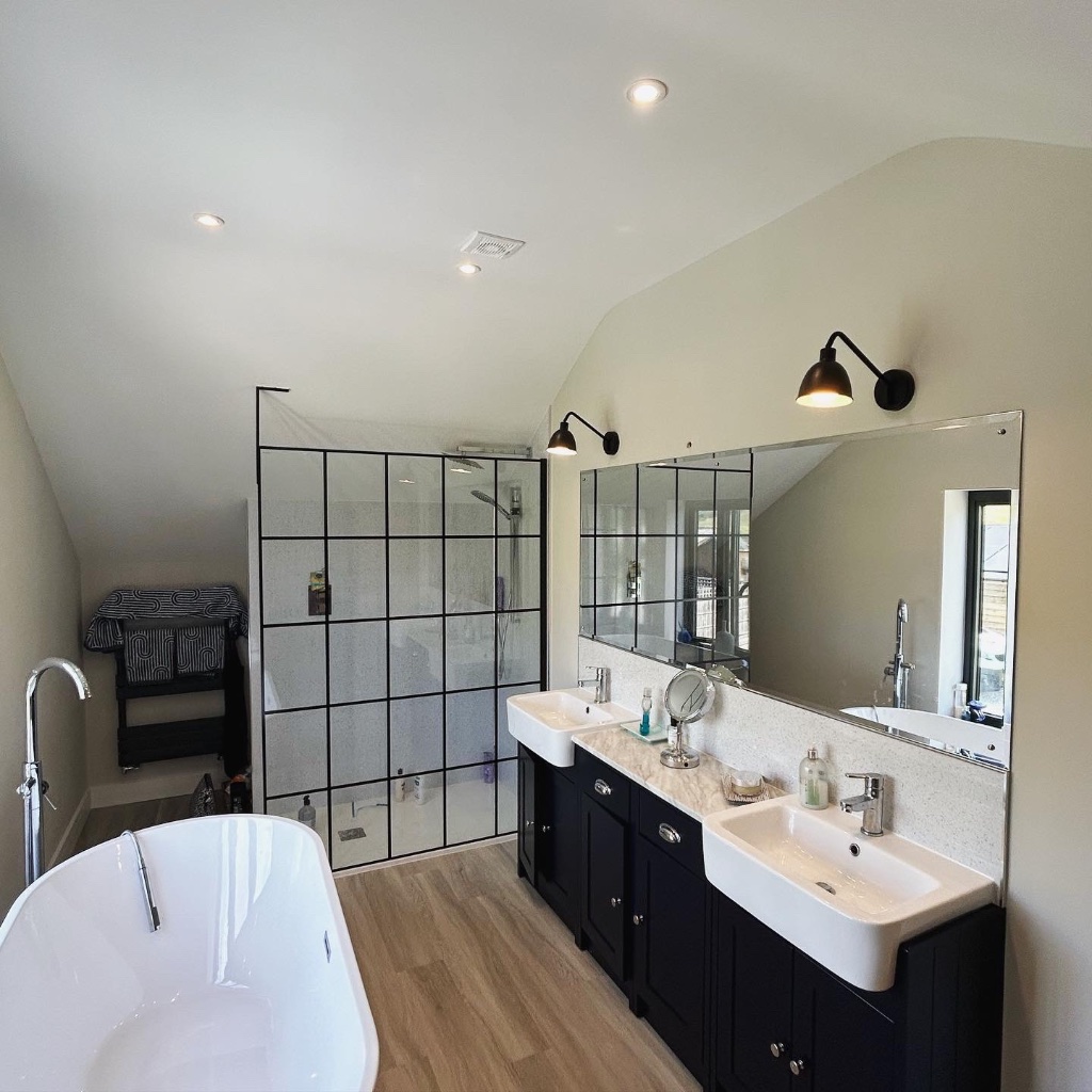 Master en-suite - recessed downlights and client-specified wall lights
