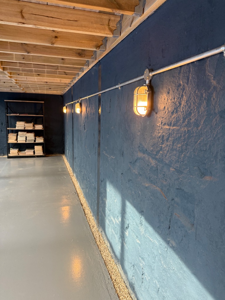 Galvanised conduit run and feature lighting detail