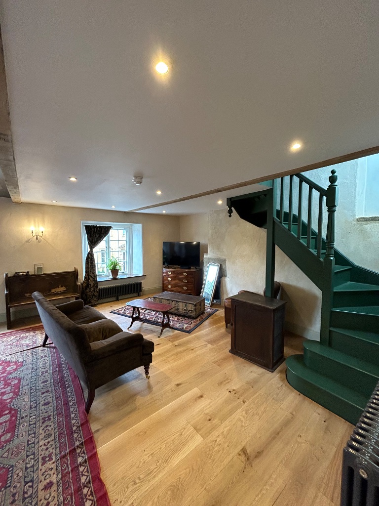 Living room with Canberra replica suspended overhead