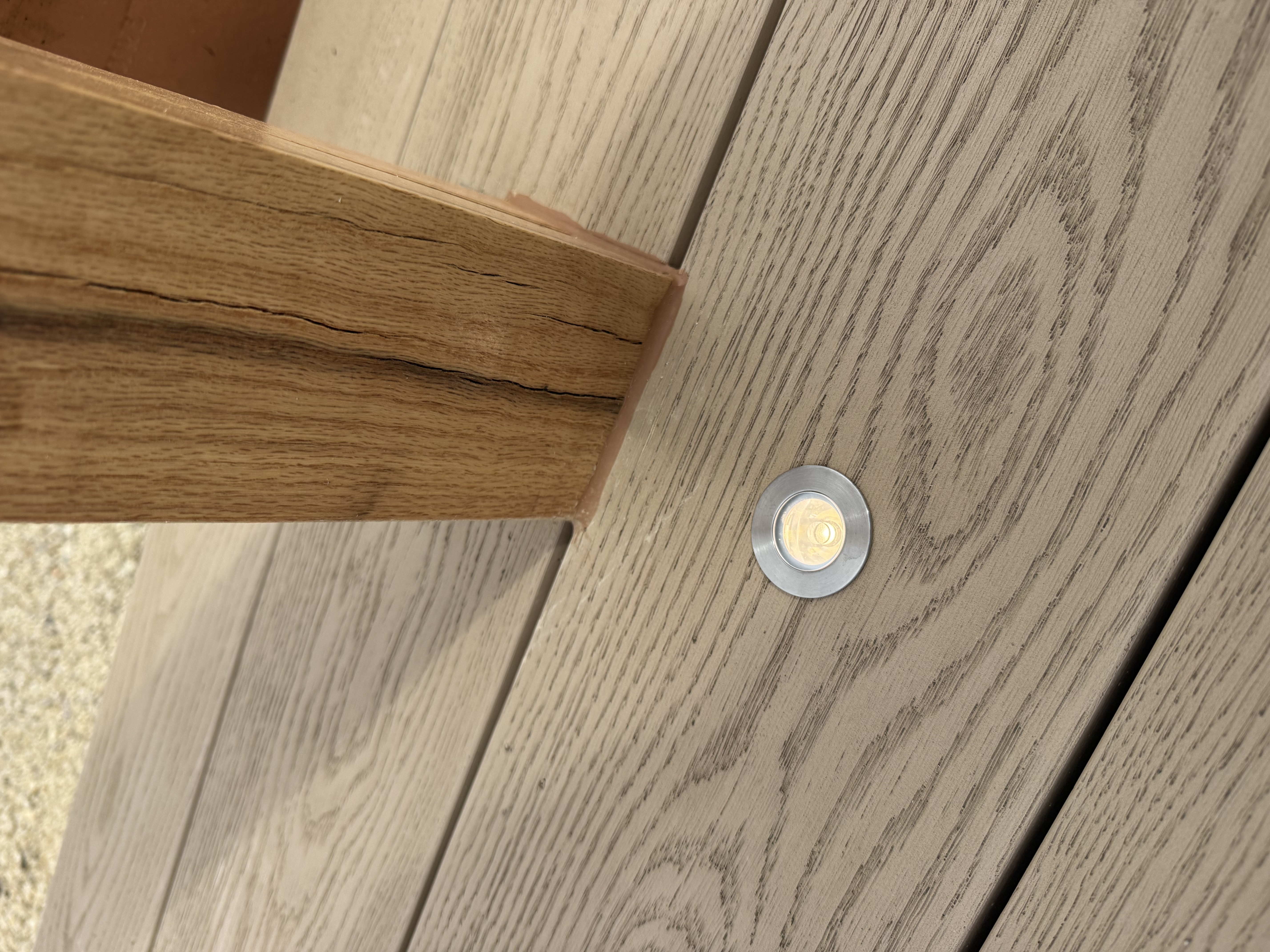 Collingwood recessed uplighters set into composite decking