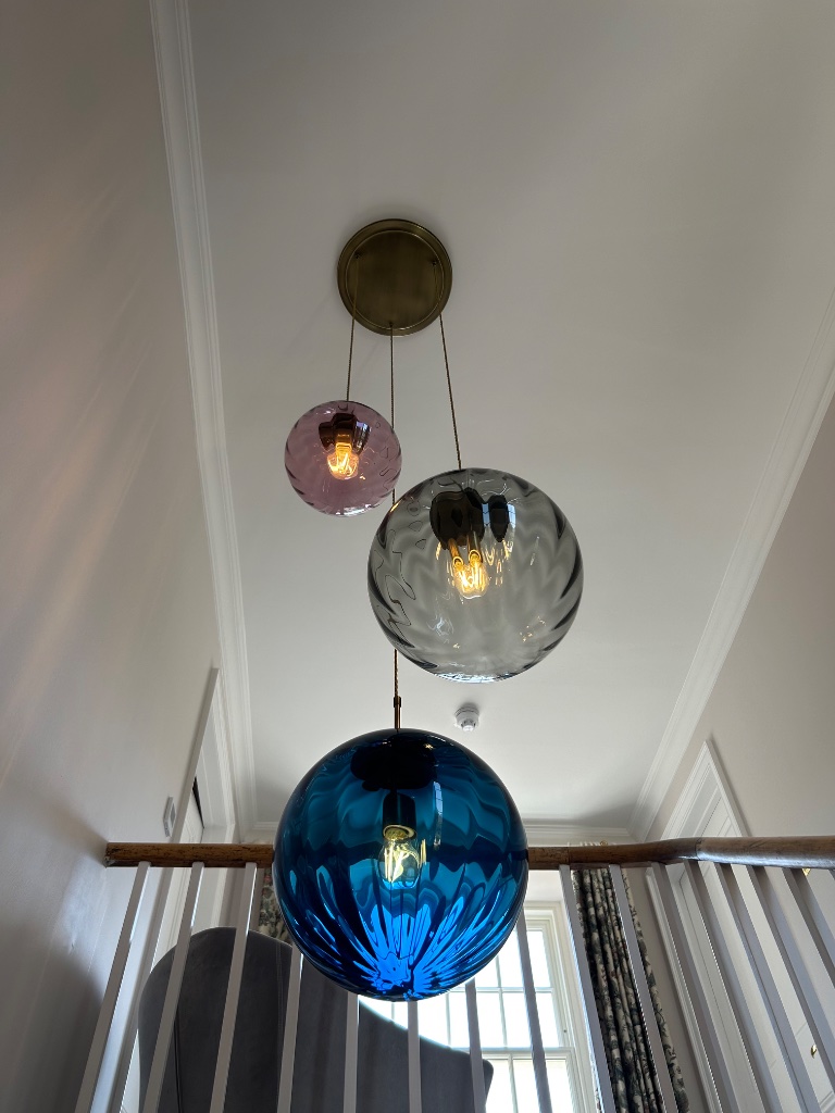 Stairwell pendant cluster - bespoke glasswork