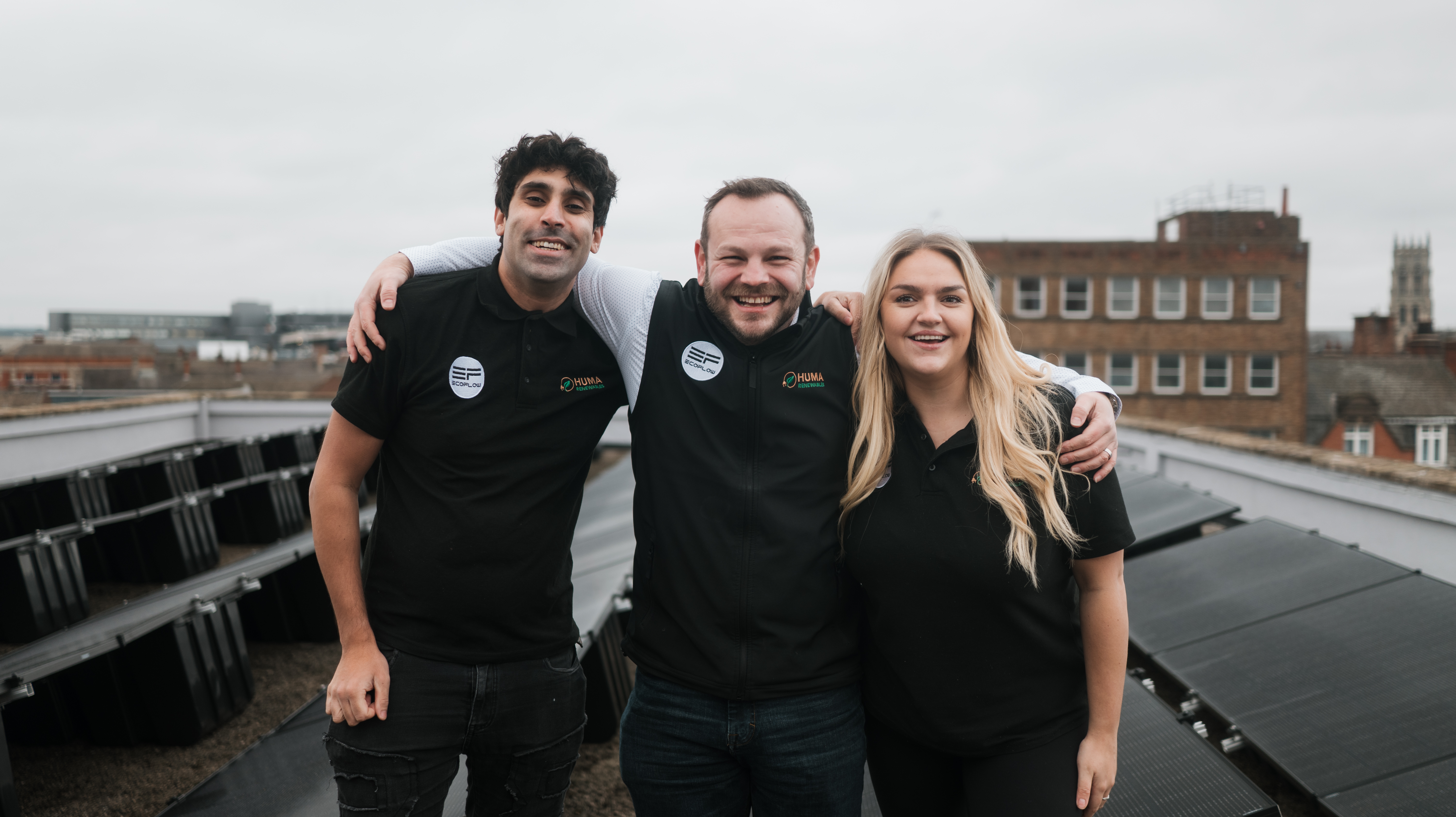 HUMA Renewables commercial team on a rooftop solar installation
