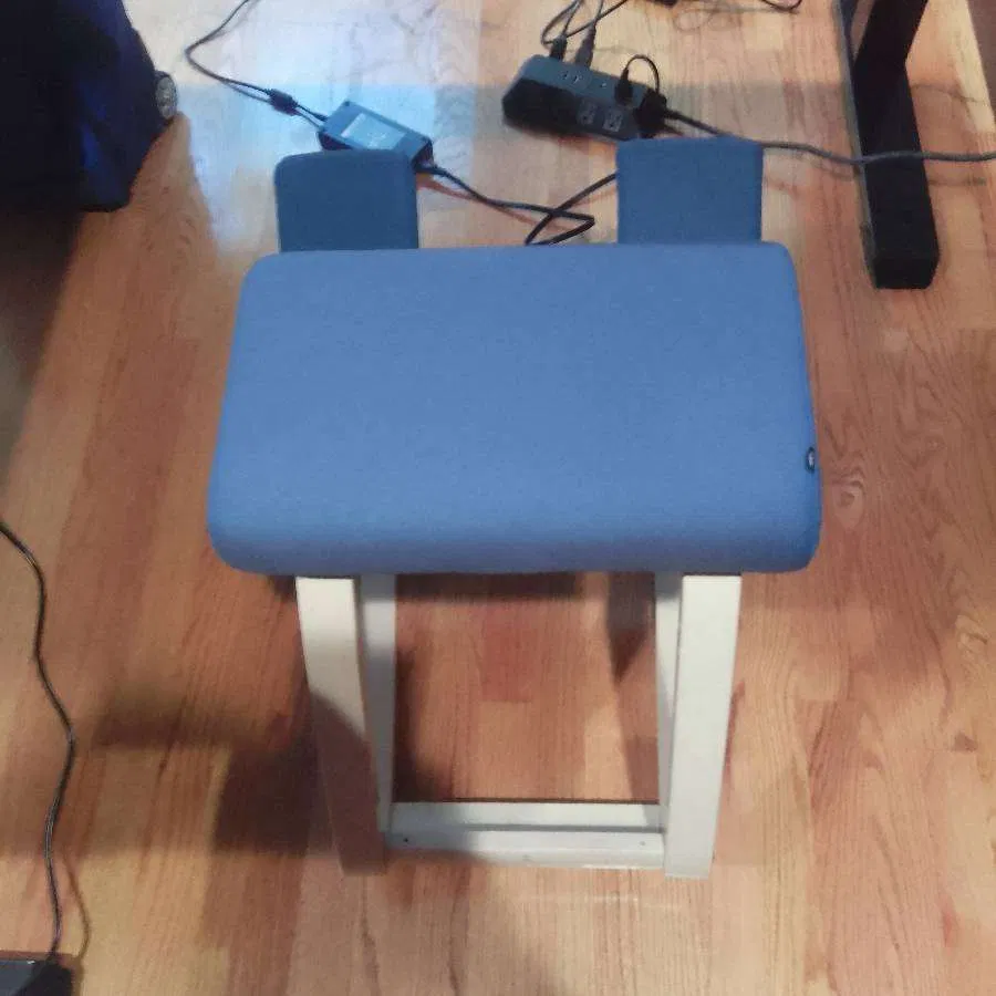 Upholstered kneeling chair built