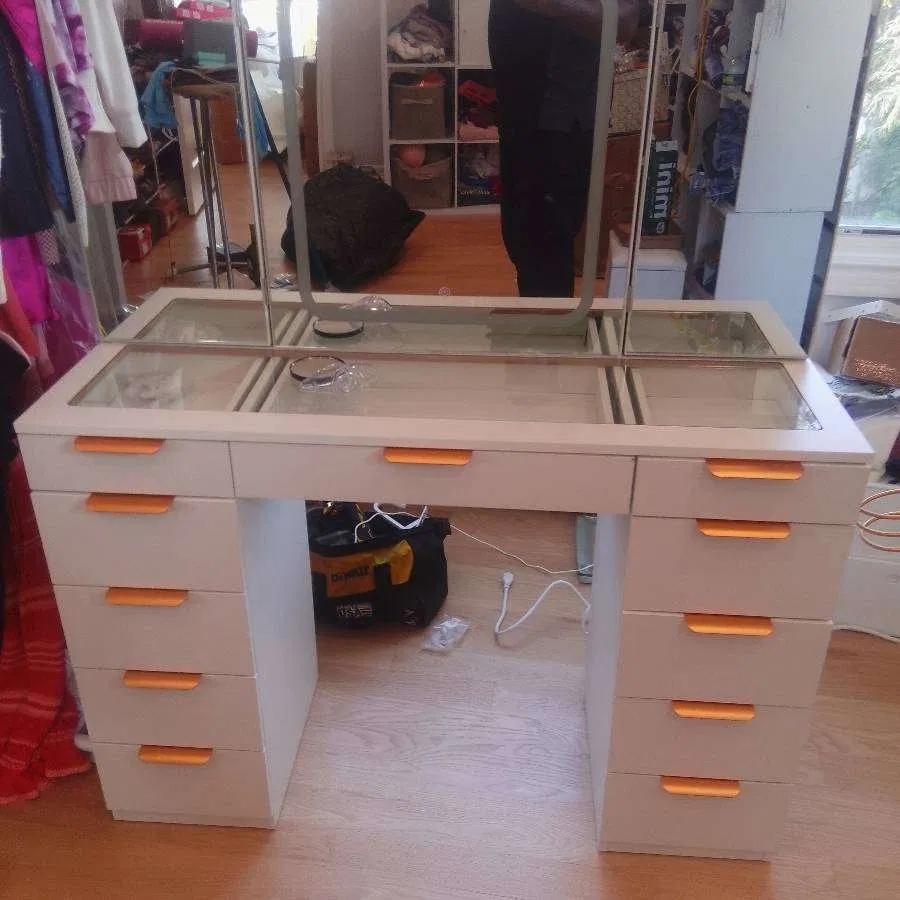 Vanity with trifold mirror assembled