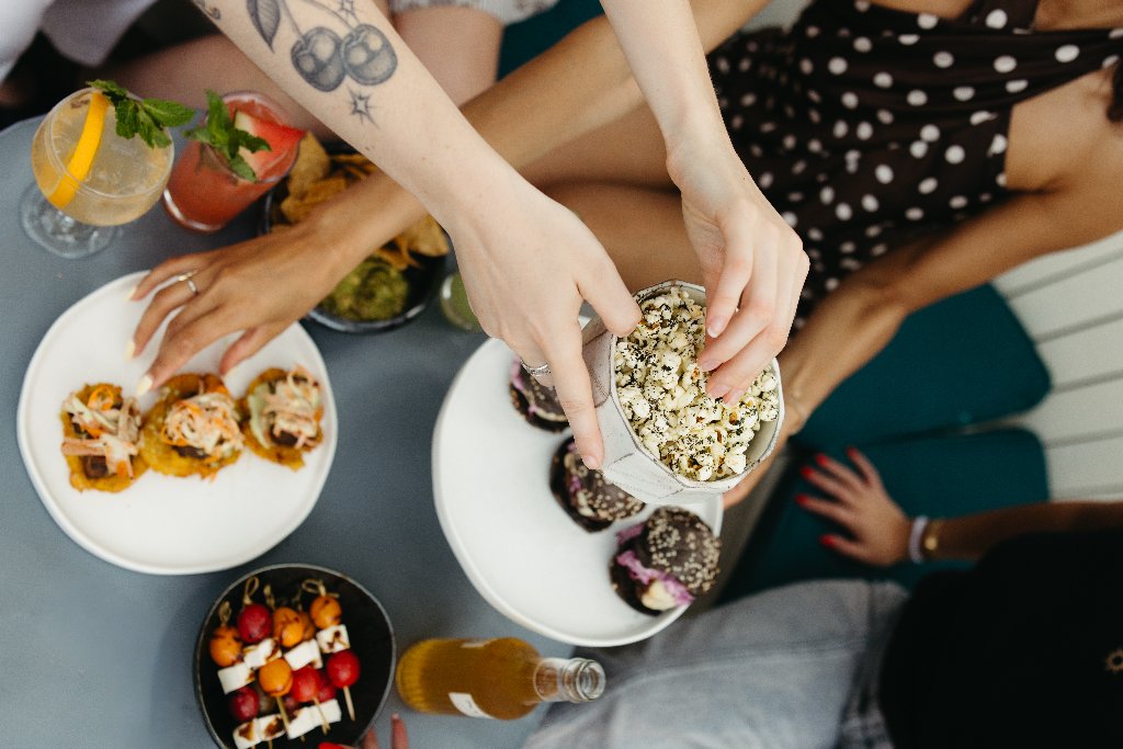 Sharing bites and cocktails at Walker Rooftop