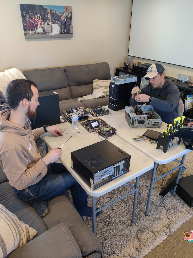 Volunteers working on computers