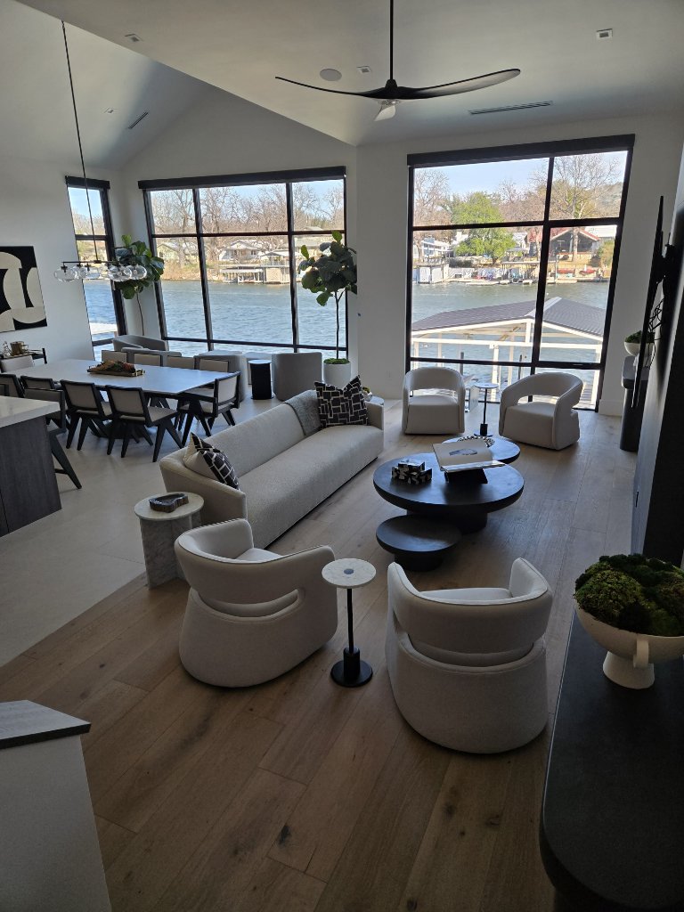 William Shore Project open-plan living room with panoramic lake views