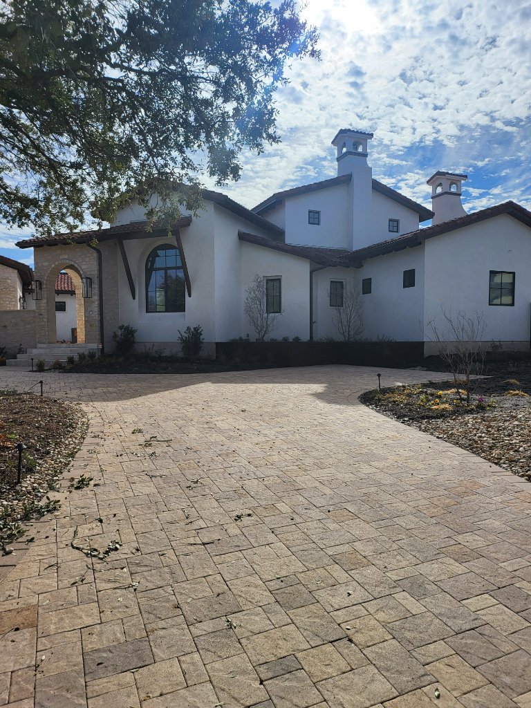 Georgetown estate exterior with stone and stucco facade