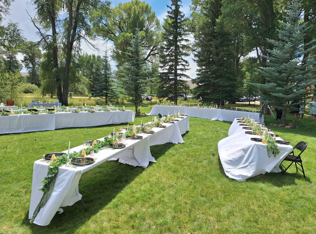 Outdoor wedding reception table setup at Spirit West