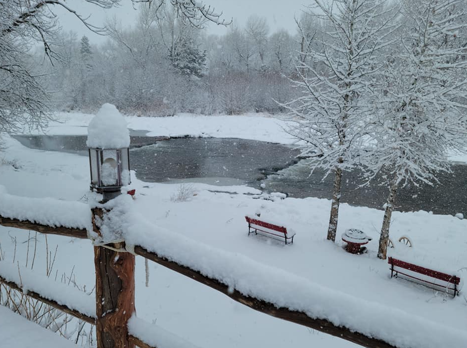 Snowy riverfront view from Spirit West