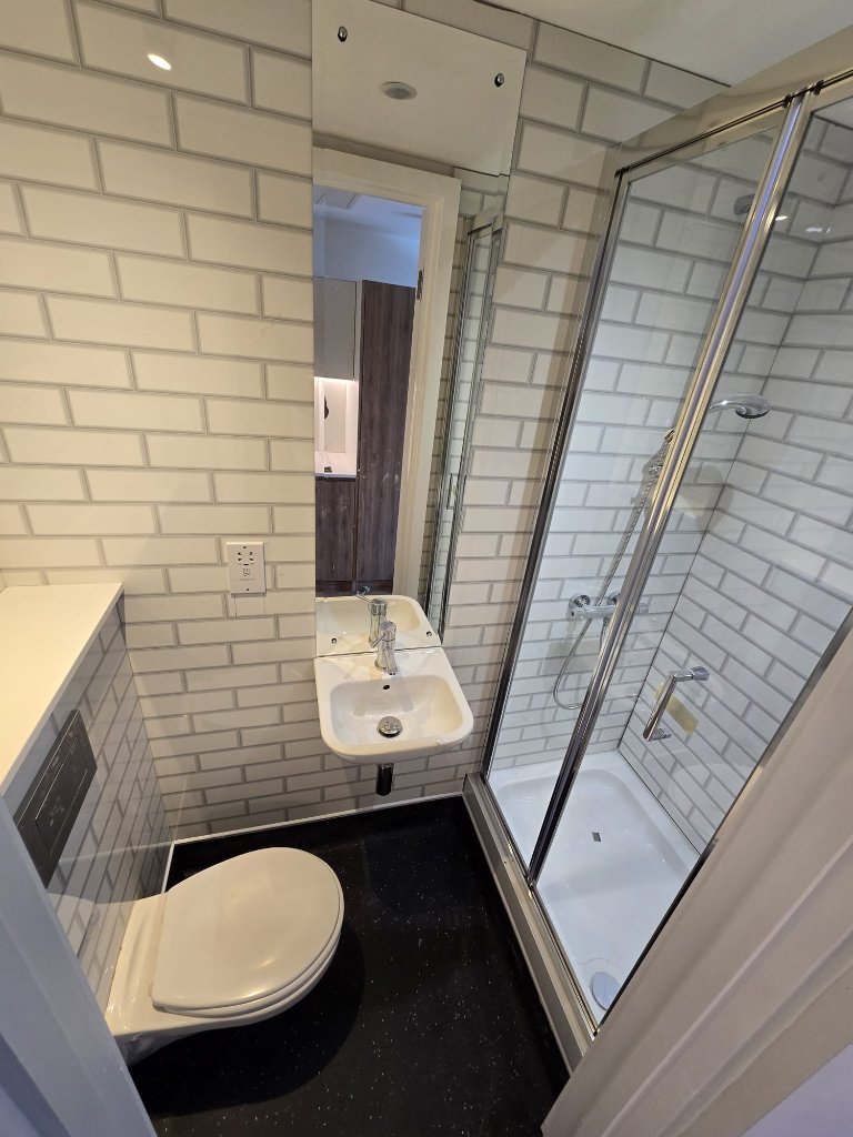 Metro Tile Shower Room with Black Shower