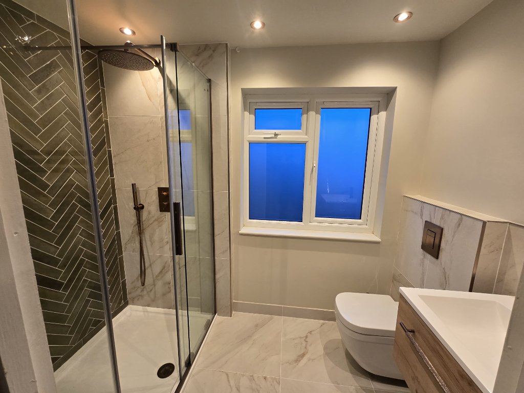 Full Bathroom — Herringbone Shower & Marble Tiles