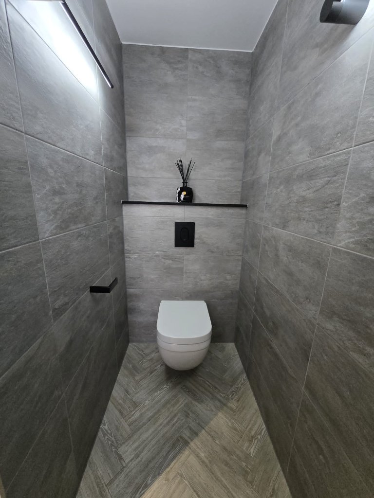 Grey Tiled WC with Wall-Hung Pan