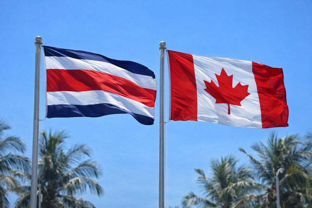 Isla Palo Seco sign with Costa Rica and Canada flags