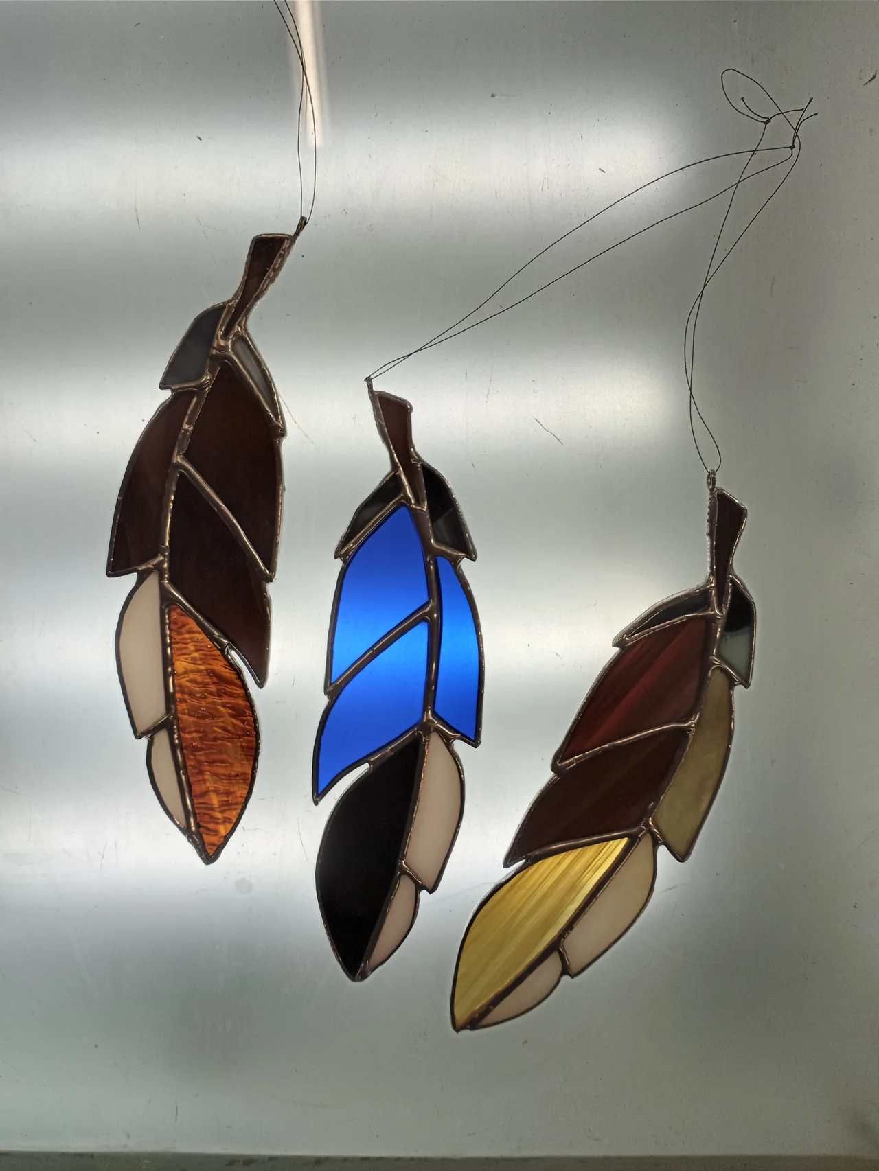 Stained Glass Feather Suncatcher โ handcrafted stained glass by Phase 3 Glass Works