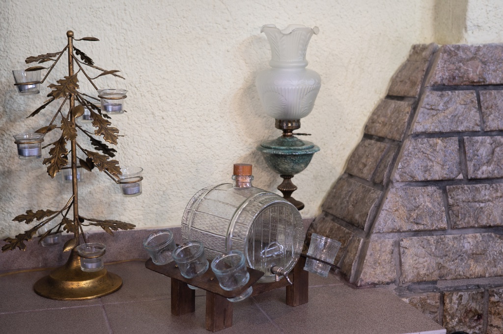 Fireplace mantle decor detail at Chalet Renata 1