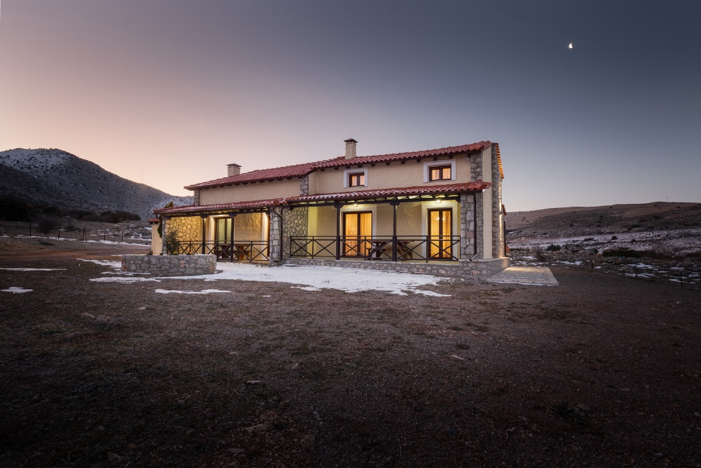 Chalet Renata 1 front facade lit at twilight