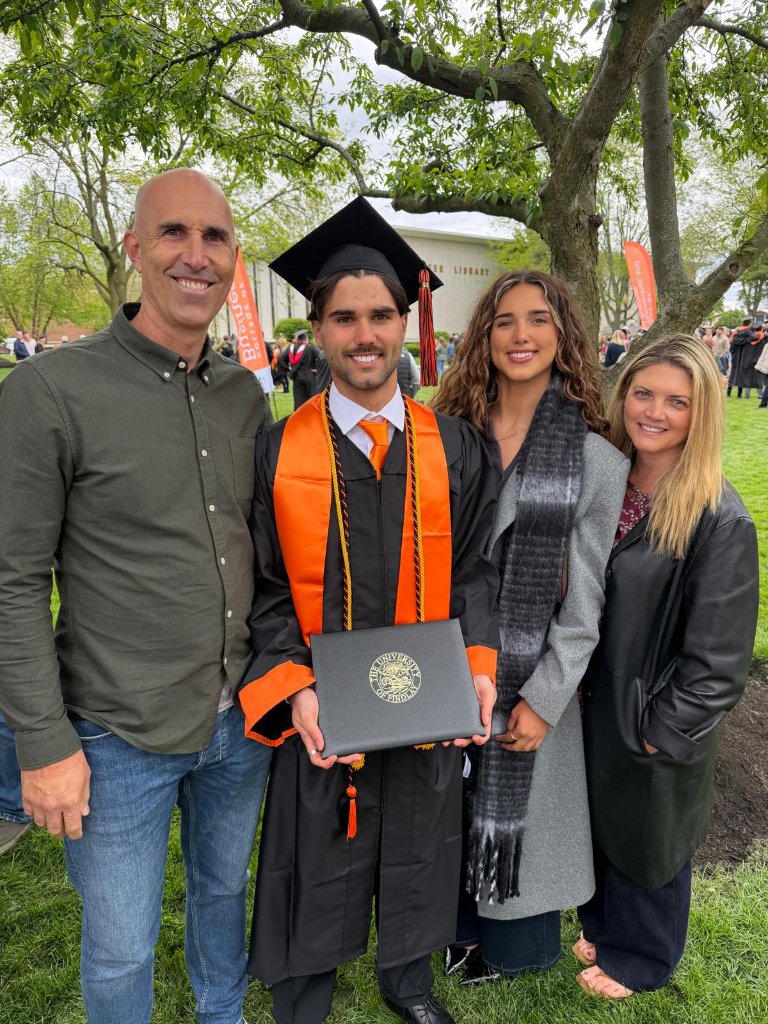 Keegan Grant at graduation ceremony, University of Findlay, with family