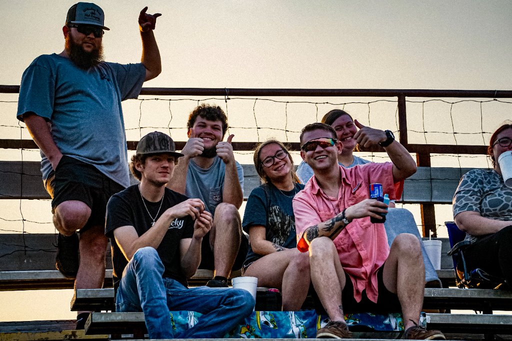 Fans cheering in the bleachers