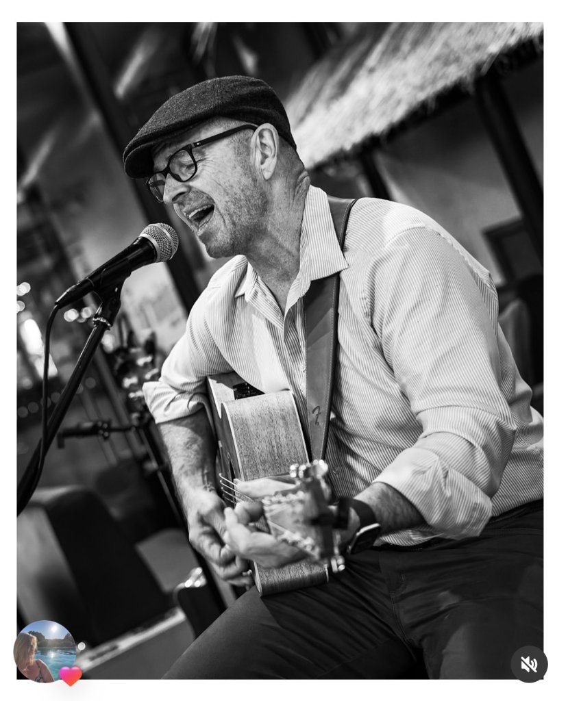Richard Ings performing live guitar at a Canberra pub