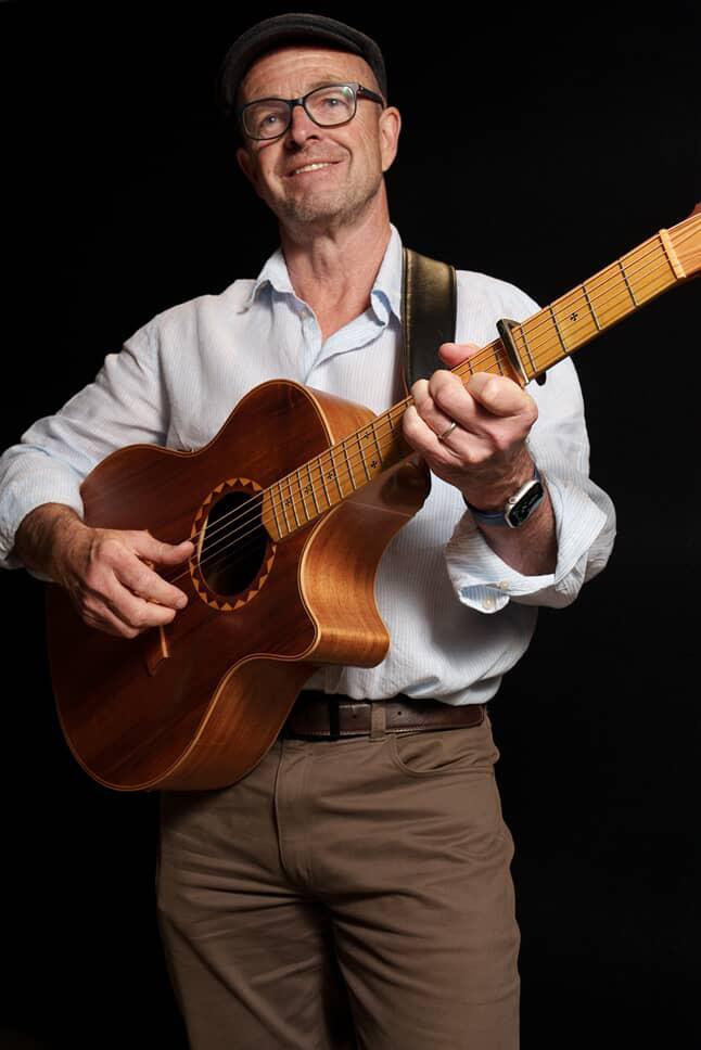 Richard Ings performing live acoustic guitar in Canberra