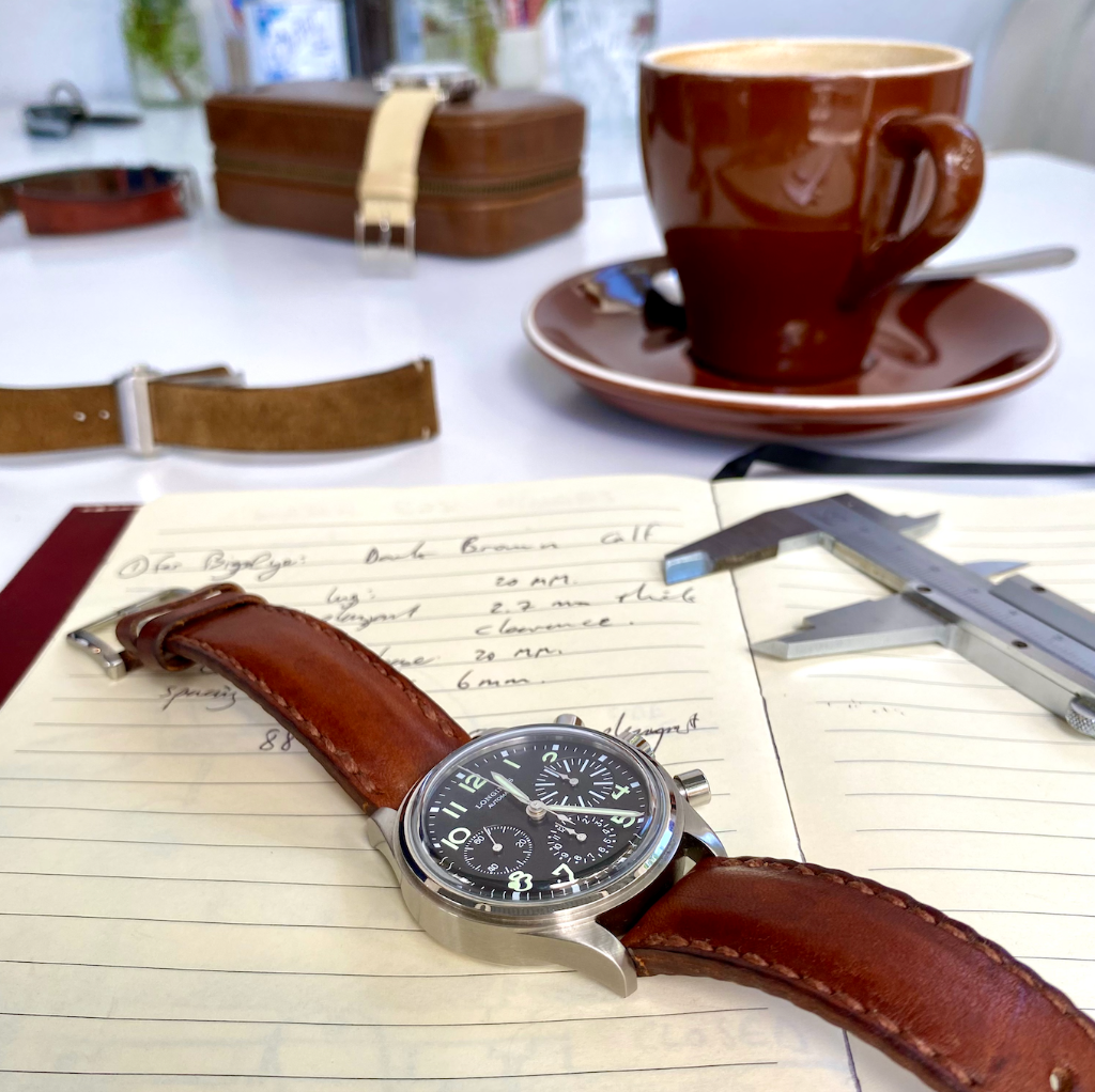 In-person watch strap consultation — Jacques brings leather samples, thread colour cards, and buckle options to a meeting in Wellington or Cape Town