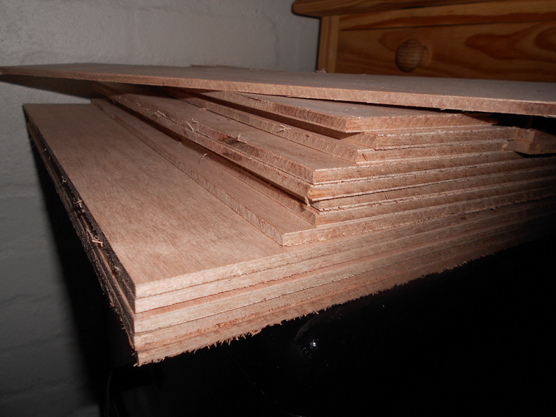 Marine plywood sheets cut to size and stacked