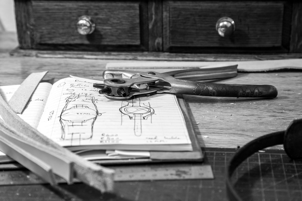 Jacques Lombard at the leather workbench hand-cutting a bespoke watch strap — Lombard Bespoke private atelier South Africa