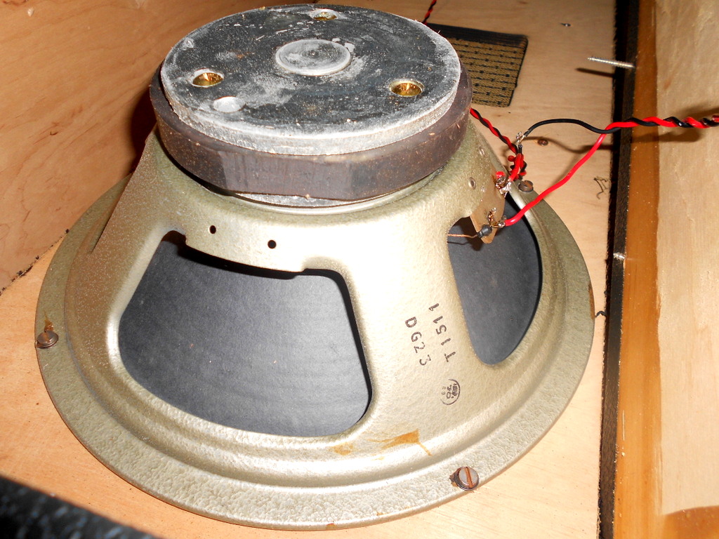 The Celestion Greenback mounted and wired inside the cabinet