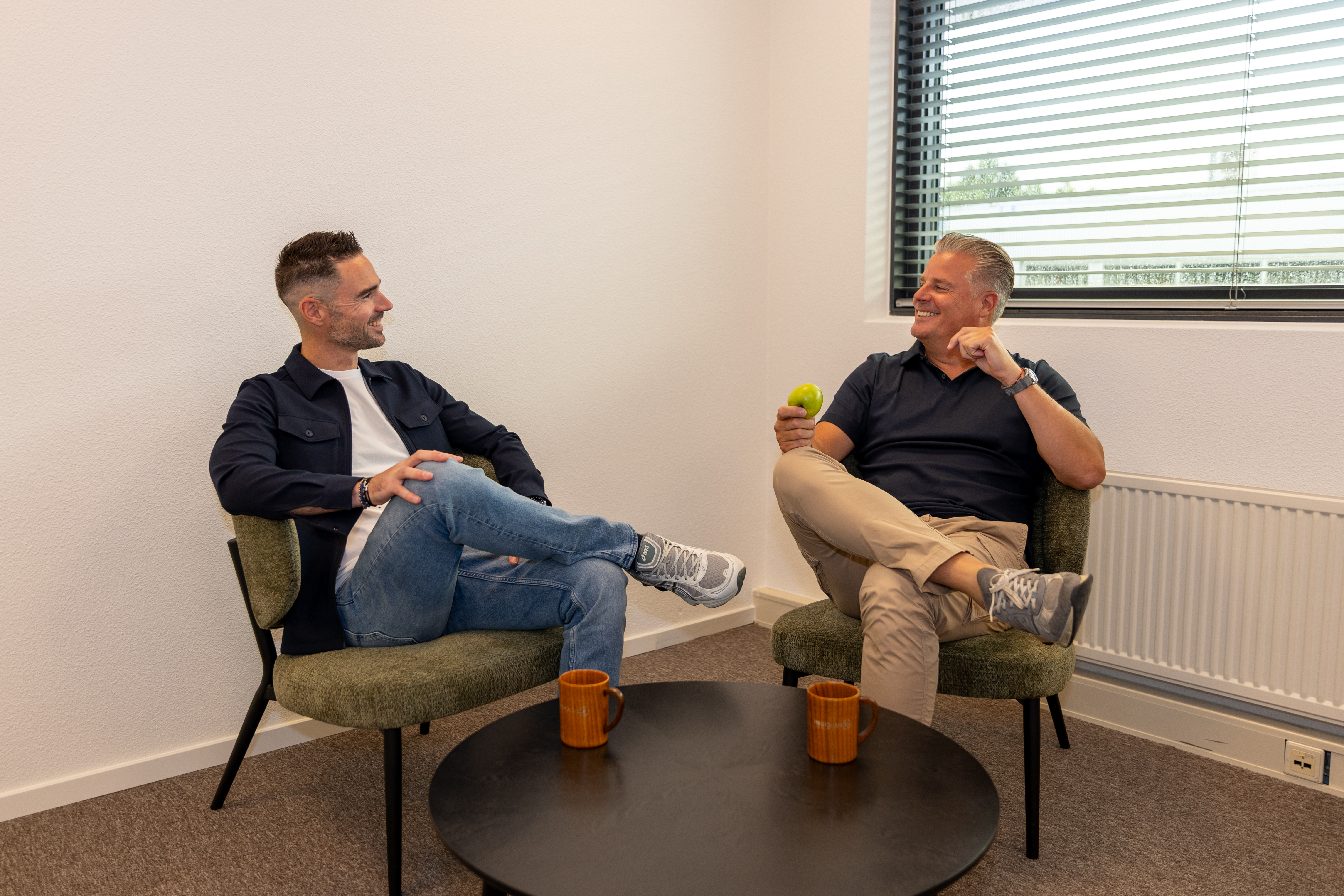 Overleg tussen twee ondernemers binnen MSD Groep