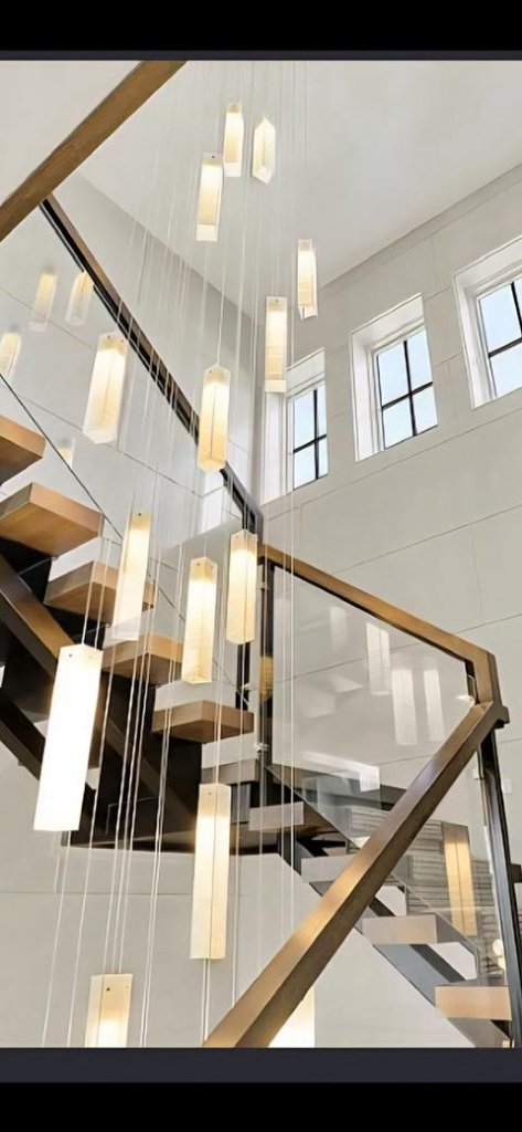 Modern pendant lighting cluster in luxury kitchen