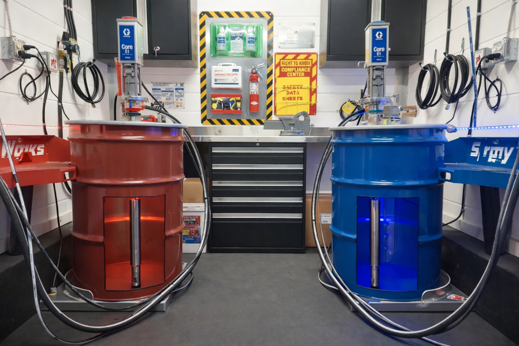 Spray foam A-side isocyanate and B-side resin drums used in two-component polyurethane foam systems