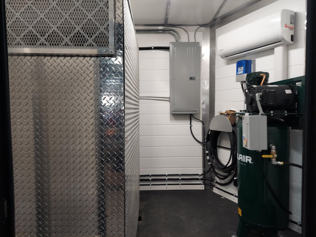 Battery power system and breaker panel in electric spray foam rig