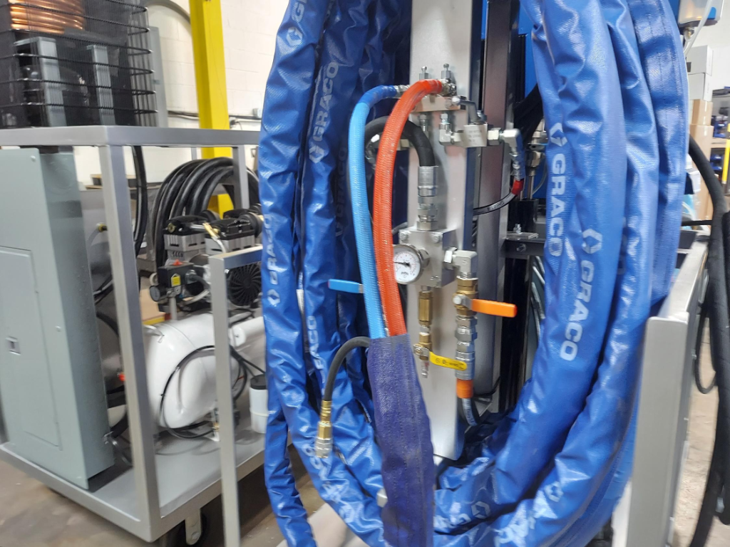 Portable spray foam plant hose connections and manifold detail