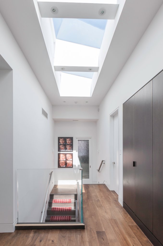 Luxury condo interior renovation Toronto — custom cabinetry Calacatta marble premium finishes by Wexler
