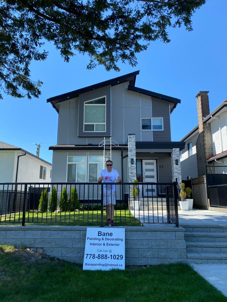 Completed home with Bane Painting sign in front — Lower Mainland