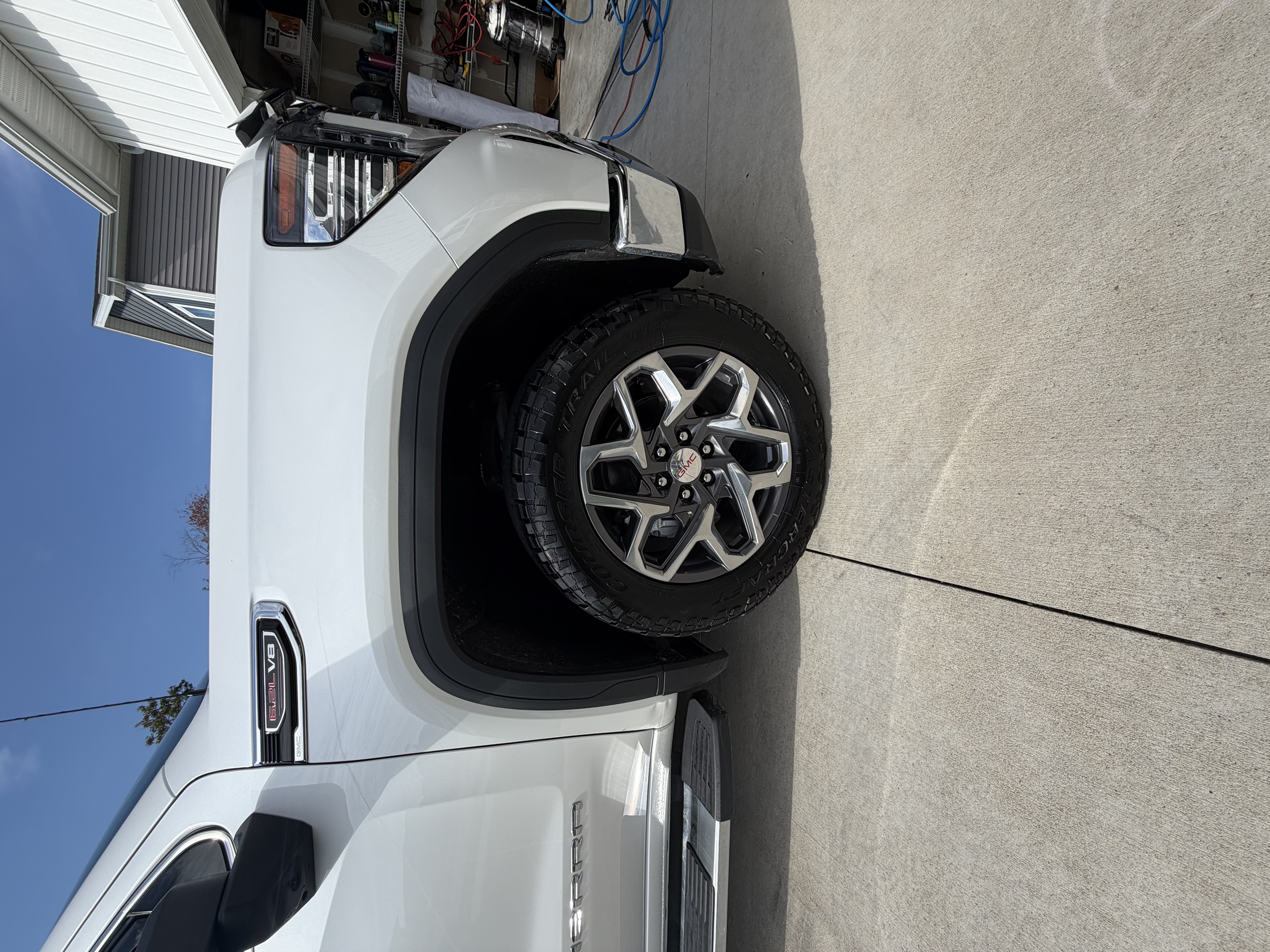 White GMC Sierra — Wheel & Fender