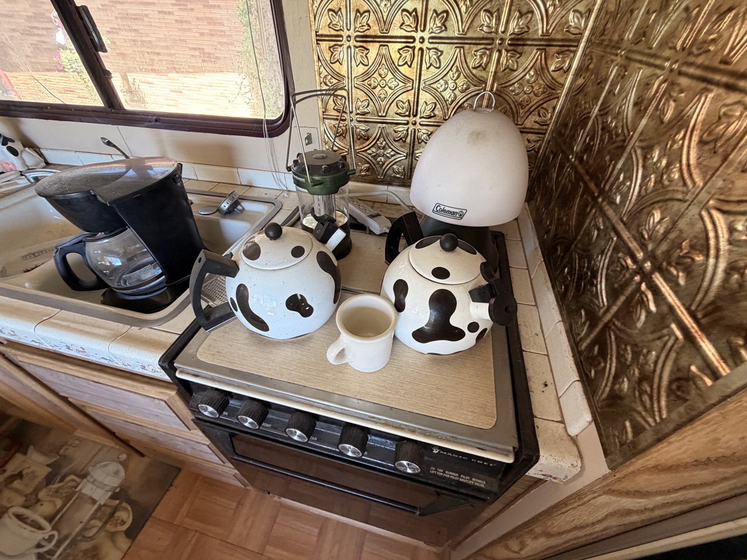 Kitchen — Magic Chef stove & pressed-tin backsplash