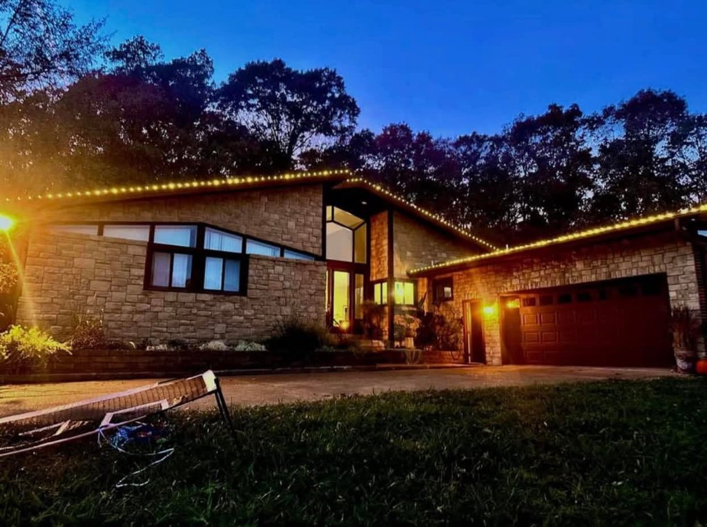 Home professionally decorated with holiday lights