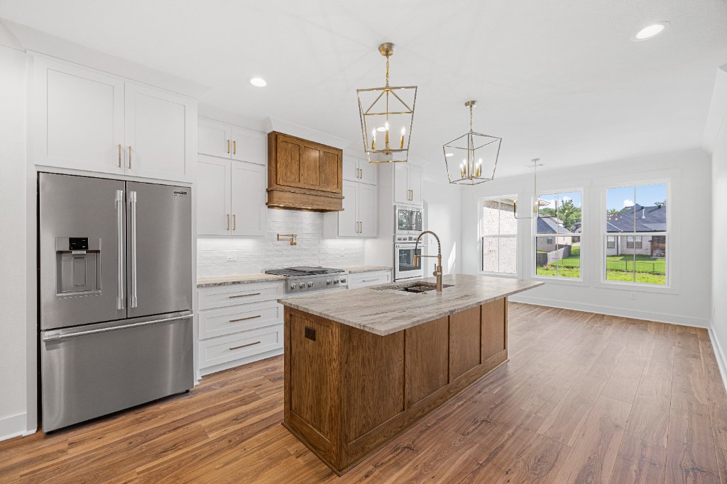 Real estate photography by Ino Imagery — Kitchen & Stone Fireplace