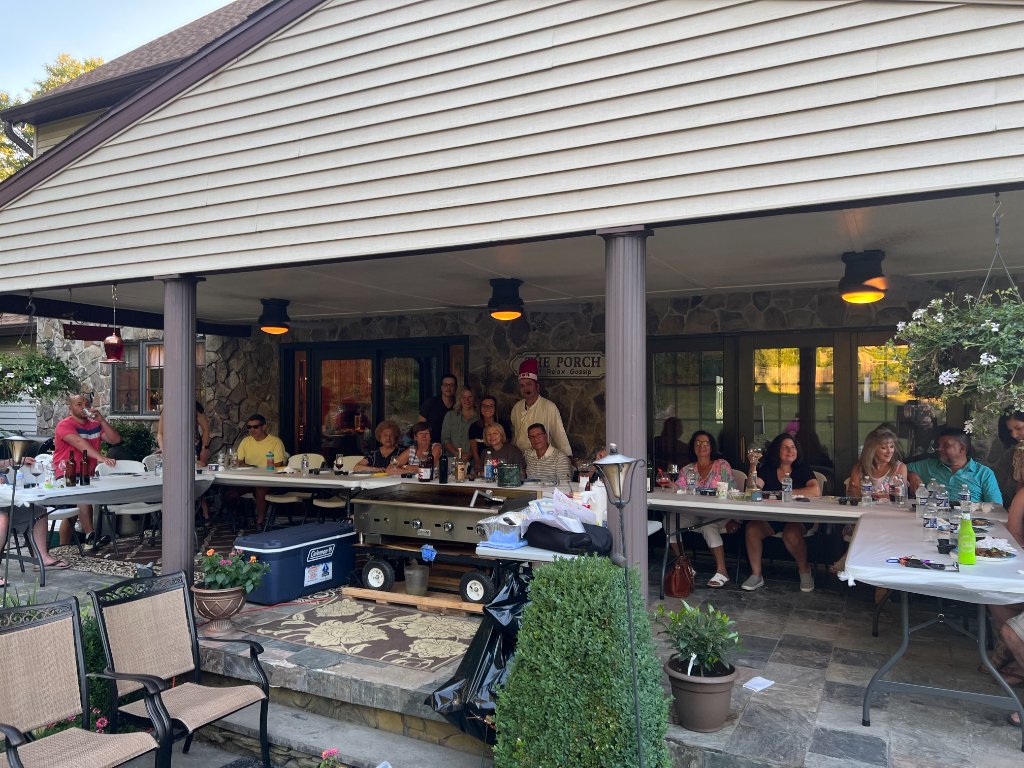 Large group photo with chef