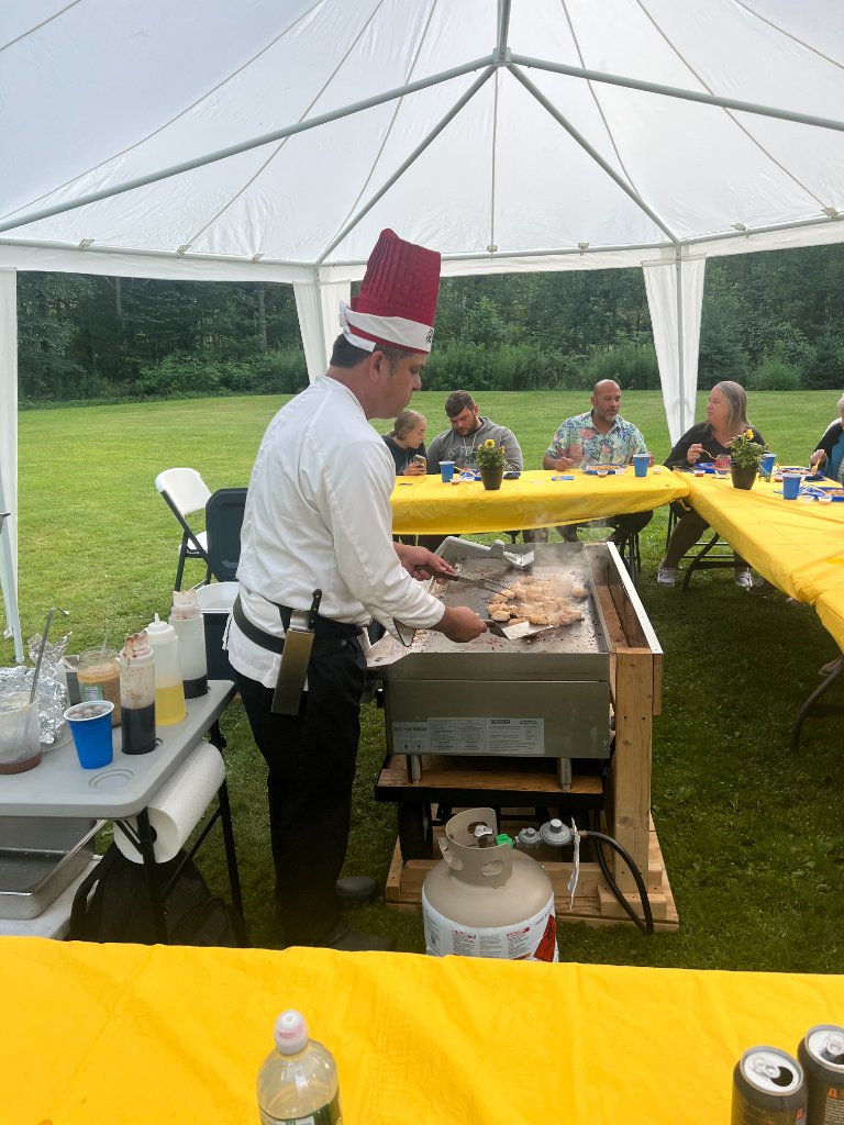 Guests dining under tent