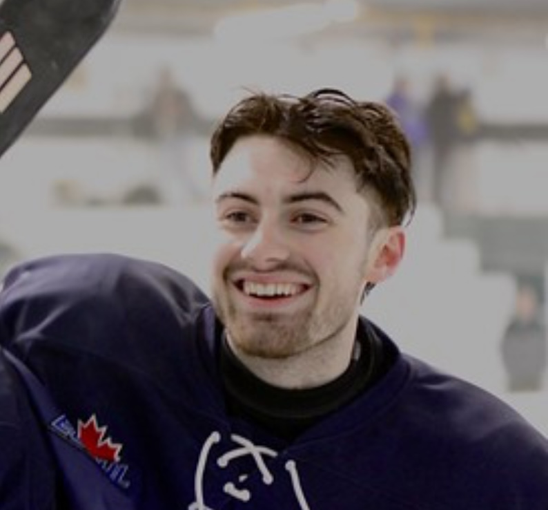 Trent Poitras, smiling headshot