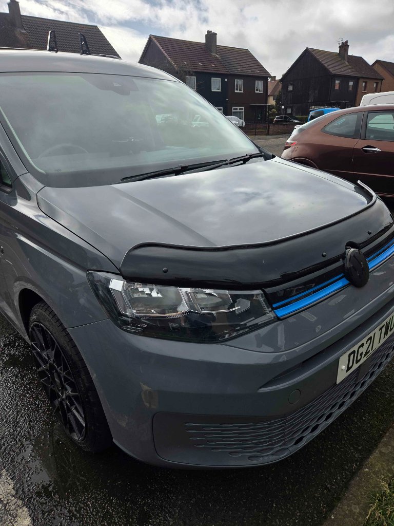 VW Caddy — front quarter before clean