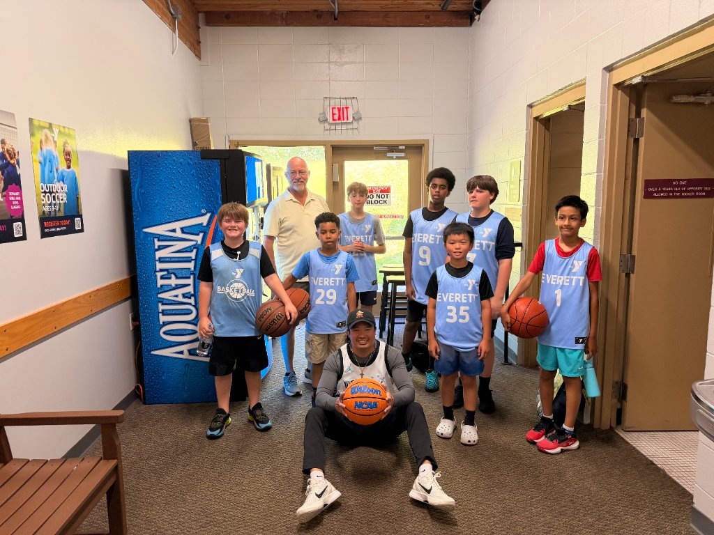 Coach Clydon with FLOW players