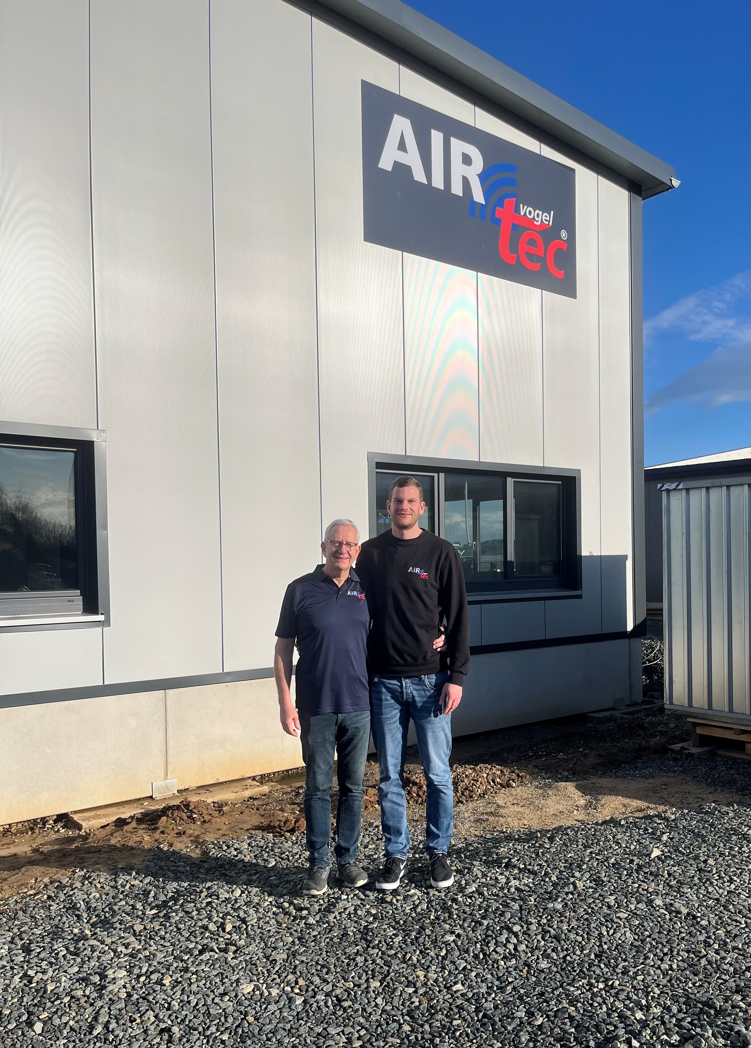 Jörg and Jan Vogel in front of the AIR-tec-Vogel GmbH company building