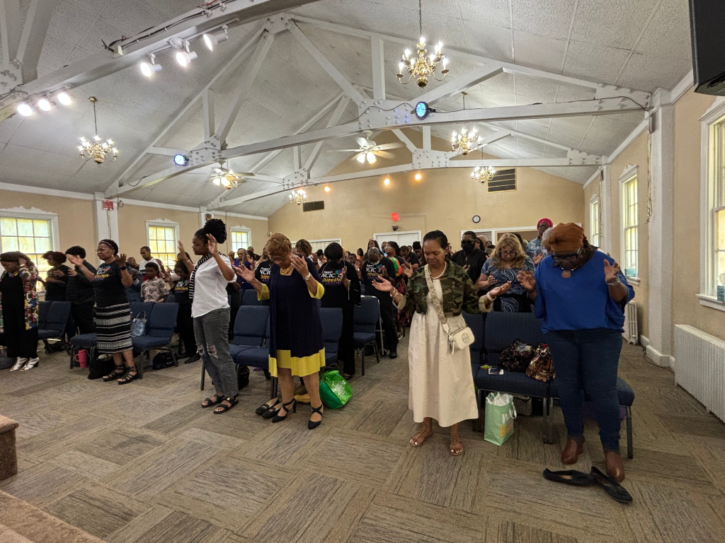 Church congregation worshipping