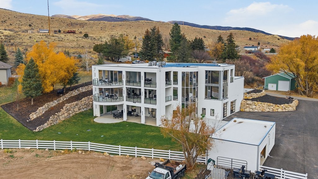 Site aerial — completed project, solar array and landscaping