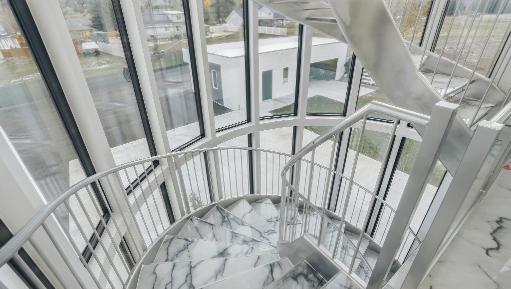Dining nook in curved glass tower